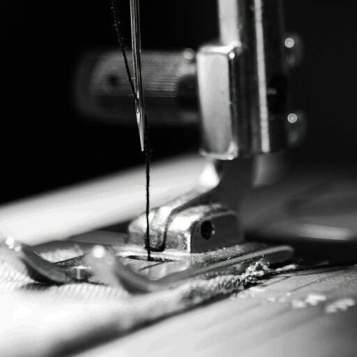 sewing machine grey-scale photography and close-up photography